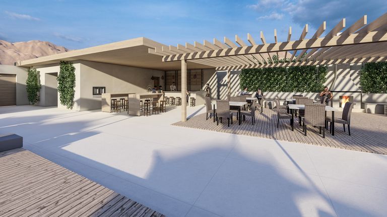 Rendering of Civana Retreat's outdoor bar and dining terrace under a wood pergola, with a living green wall and fire feature